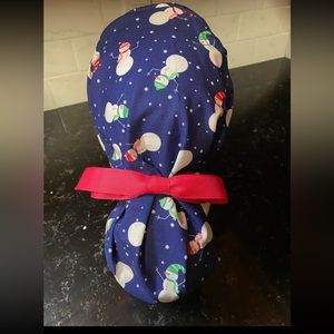 Snowman scrub cap with buttons. Ponytail tie back. Handmade. Like new!